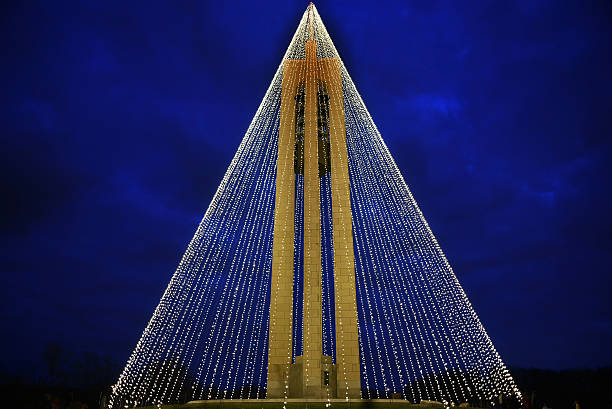 Carillon Bell Tower with Christmas Lights at Night, Horizontal, HDR The Deeds Carillon Bell Tower, Dayton, Ohio, decorated with 20,000 white Christmas lights by "Dayton History", Dayton's Historical society. carillon stock pictures, royalty-free photos & images