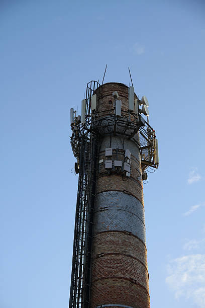istock Radio signal transmitter system on old smokestack 502348692