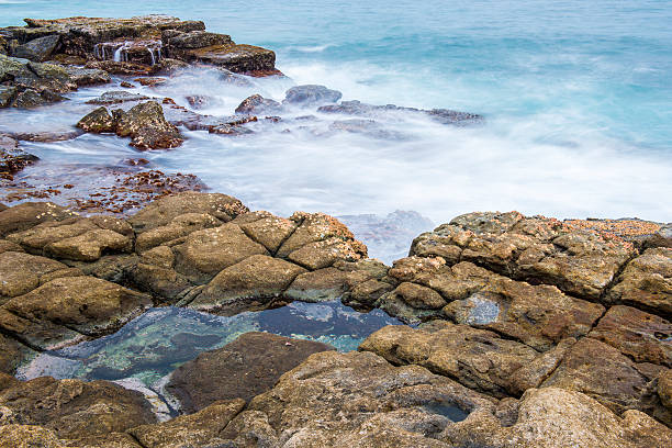 istock Rocks and waves at Point Cartwright 502349454