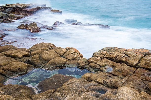 istock Rocks and waves at Point Cartwright 502349484