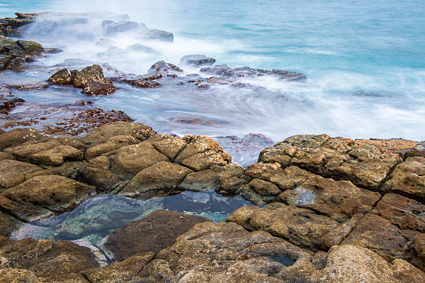 istock Rocks and waves at Point Cartwright 502349524