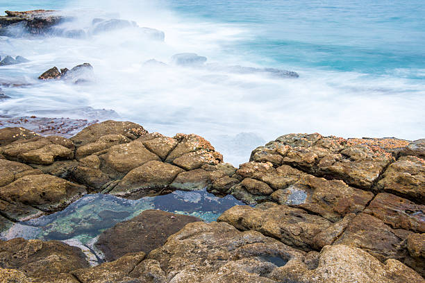 istock Rocks and waves at Point Cartwright 502349570