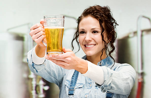 istock Cheerful female brewmaster in alcohol industry 502349850