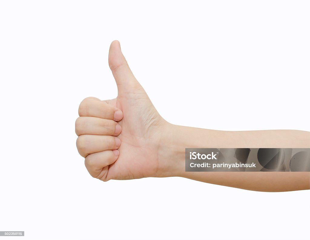 Hand with thumb up on white background. Hand with thumb up isolated on white background. Ok sign by woman Adult Stock Photo