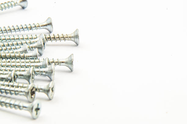 Frame of Silver Concrete nails on white - stock photo
