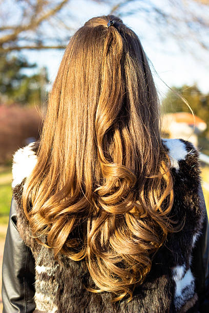 istock Curly hair woman 502351076