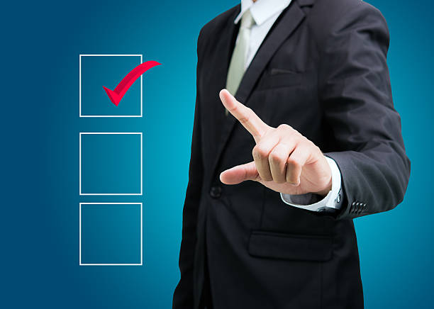 istock businessman touch checking mark checklist marker Isolated 502351221