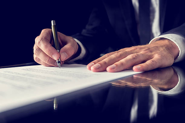 istock Signing legal document 502351625