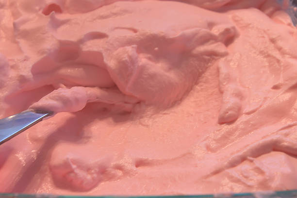 istock Pink Whipping cream background 502354146