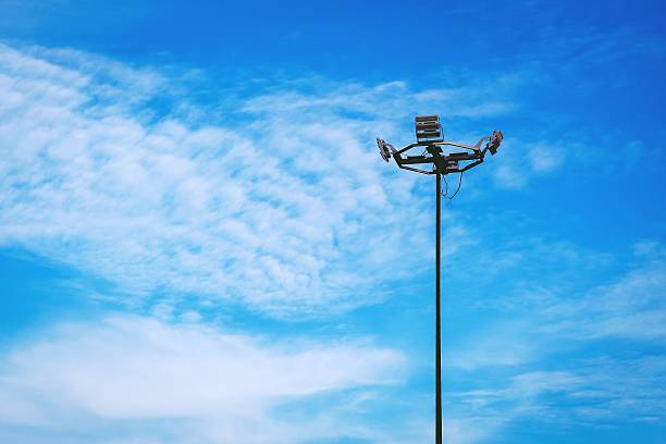 istock Street light with halogen lamp against blue sky 502356988