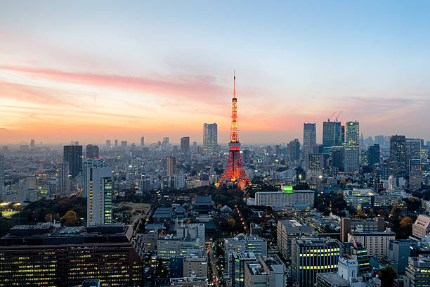 Tokyo Skyline Sunset over Tokyo. Tokyo  is both the capital and largest city of Japan. The Greater Tokyo Area is the most populous metropolitan area in the world. tokyo prefecture tokyo tower japan night stock pictures, royalty-free photos & images