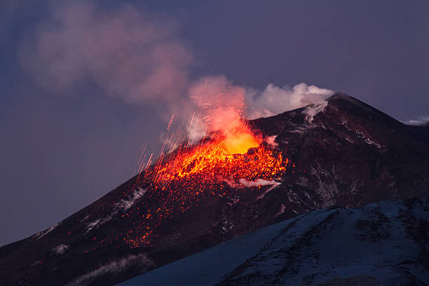 istock Volcano eruption. Mount Etna erupting from the crater Voragine. 502358078