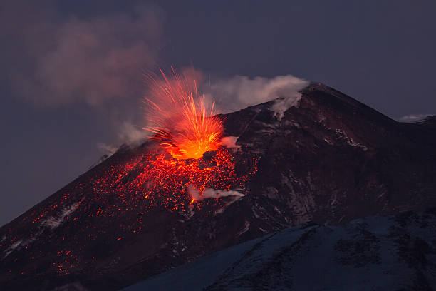 istock Volcano eruption. Mount Etna erupting from the crater Voragine. 502358232