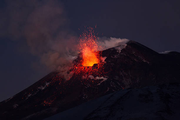 istock Volcano eruption. Mount Etna erupting from the crater Voragine. 502358458