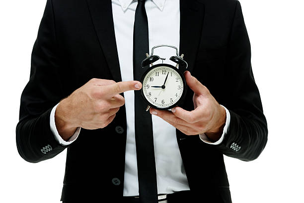 istock Businessman pointing at time 502359240