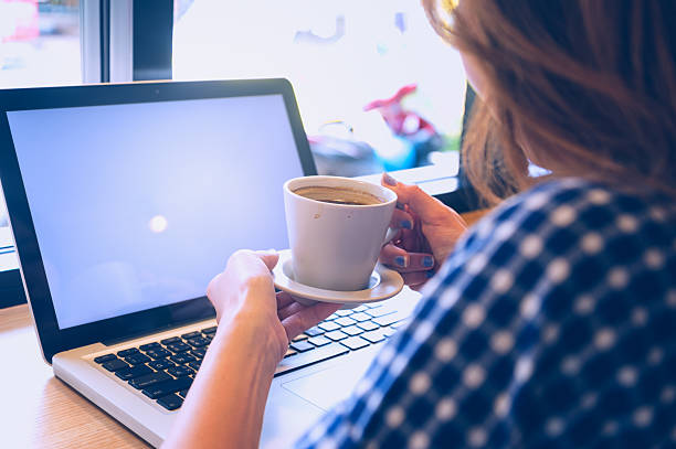 istock Woman with laptop and cup. Vacations concept. 502359840