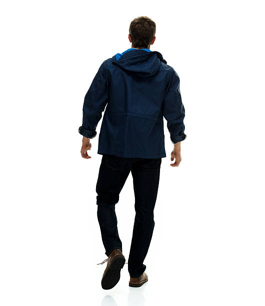 istock Rear view of casual man walking 502360274