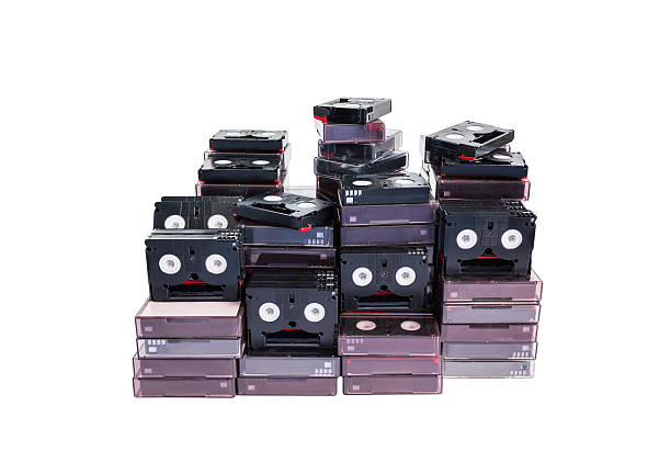 istock Isolated abandoned pile of old useless mini DV 502362128
