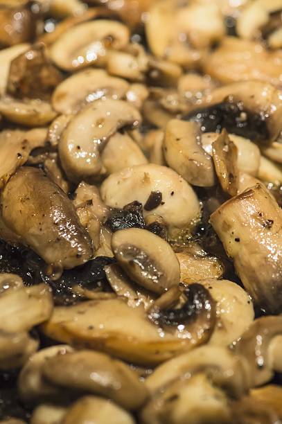 istock fried mushroom in frying pan 502362754