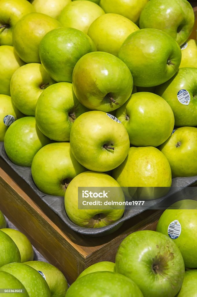 green apple background green apple background from market shelves real with flaws and b 2015 Stock Photo