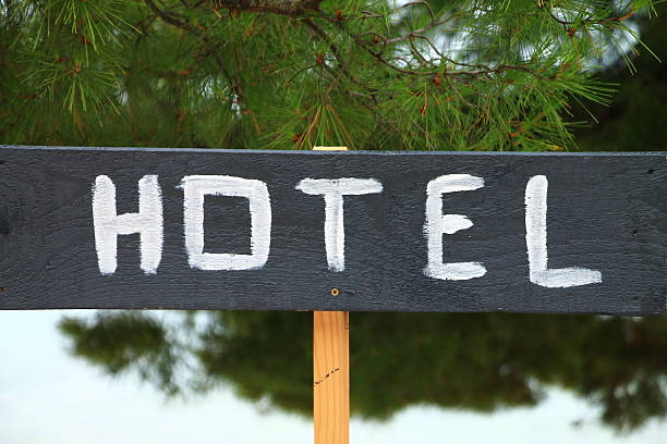 istock Hotel sign with pine tree in background , Croatia 502375181