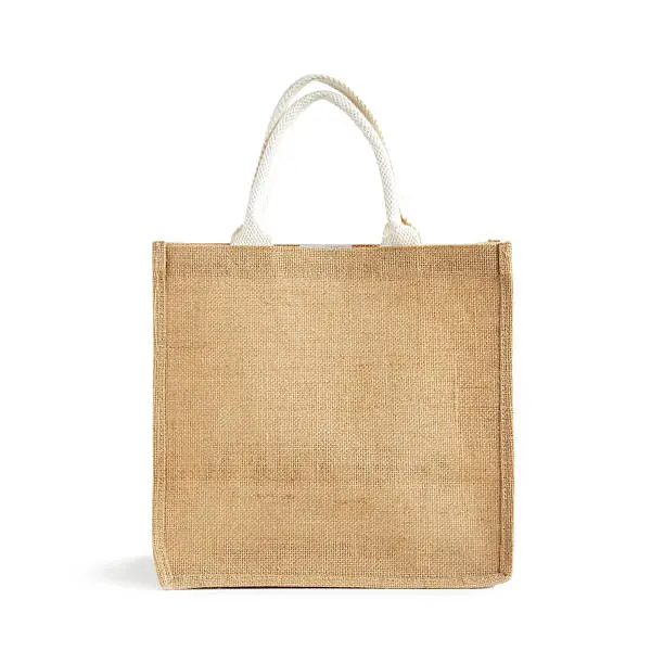 Hessian or jute bag - reusable brown shopping bag with loop handles - isolated