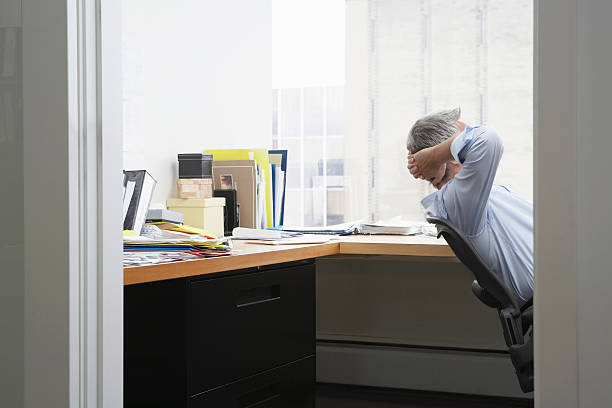 istock Businessman Sitting At Office Desk 502375759