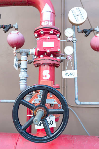 istock water sprinkler system control, fire fighting pipeline, red metal pipe 502377015