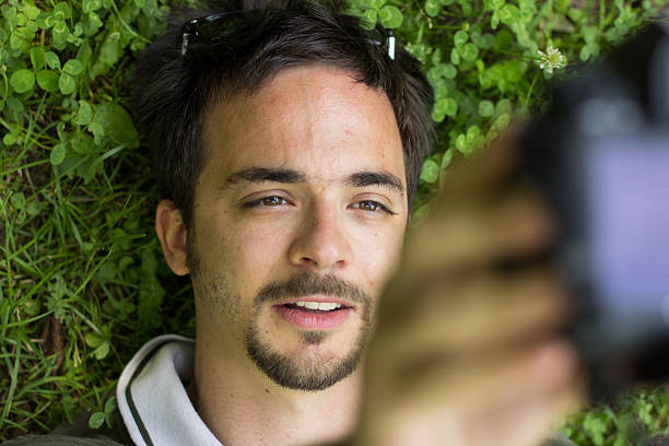 istock Portrait of handsome young man taking a selfie 502377781