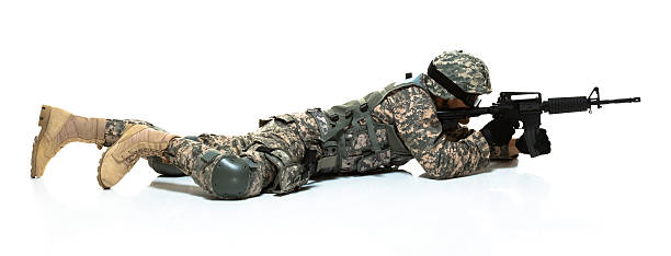istock Army man lying on floor & in action with rifle 502377965