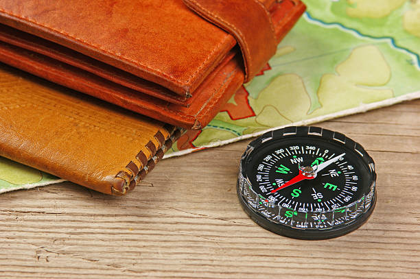 istock old map and compass on a wooden table 502379375
