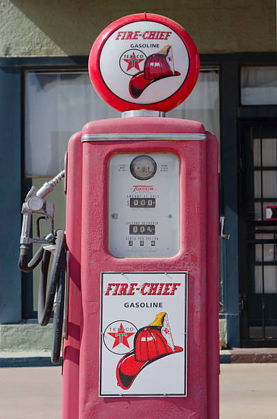 Tucumcari, United States - May 16, 2014: The Texaco Trade Station is a service station along historic Route 66 in Tucumcari, New Mexico.  It still has original Texaco gas pumps, but the price of fuel has certainly changed since the Mother Road was popular!
