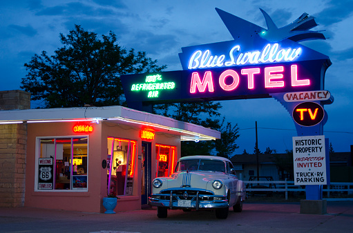 Tucumcari, United States - May 16, 2014: The Blue Swallow Motel is a legendary lodge along historic Route 66 in Tucumcari, New Mexico.  Its neon sign still touts 