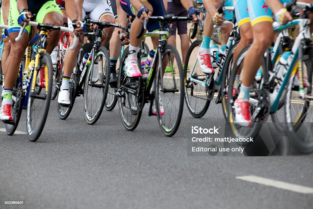 Cycling race London, United Kingdom - July 7, 2014: Road racing bikes in the Tour de France peloton. The race was first organised in 1903 and is held over 23 days. Tour de France Stock Photo