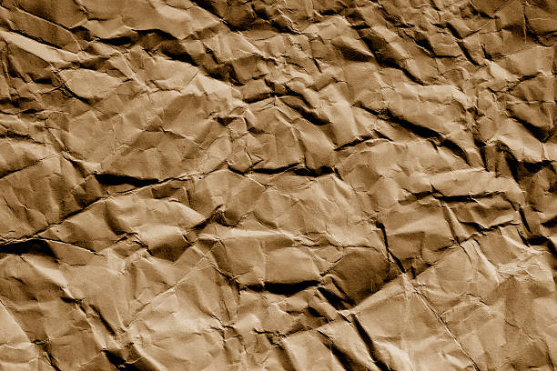 istock background and texture of brown crumpled paper 502385954