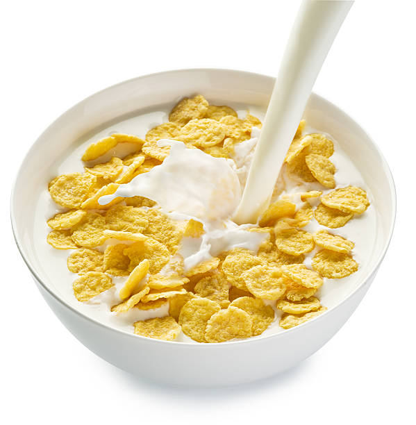 istock Cornflakes in the bowl on white background. 502388662