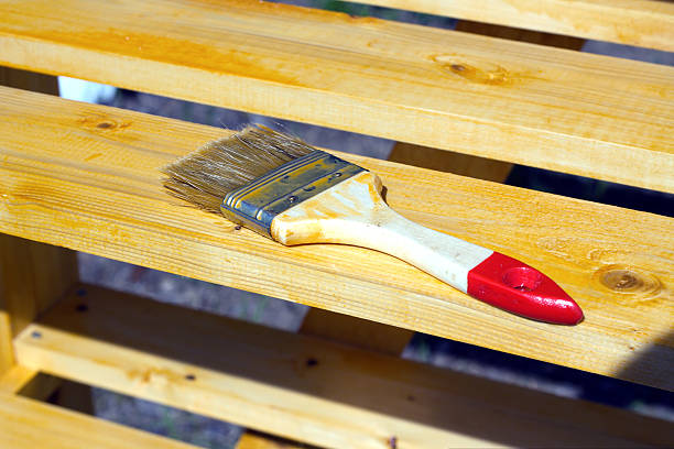 istock Brush lying on a painted wooden shelving surface 502389824