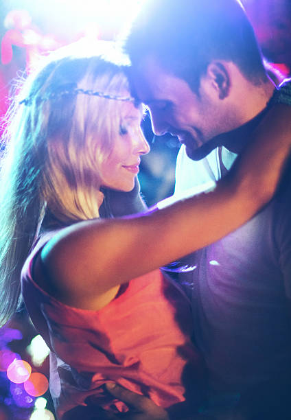 istock Two people dancing at concert. 502390338