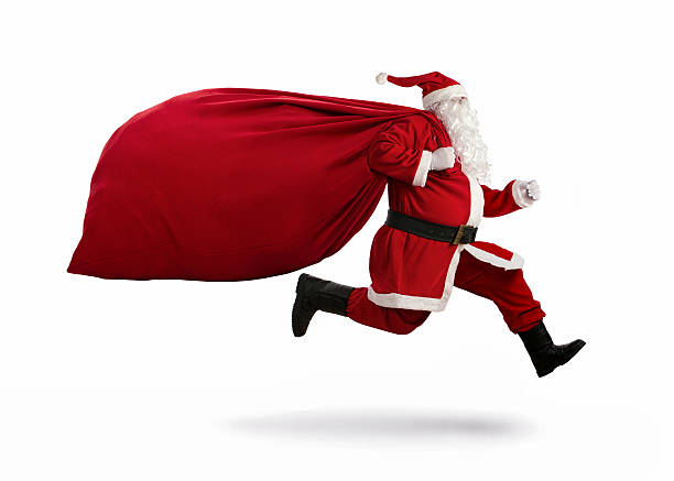 Santa Claus on the run Santa Claus on the run to delivery christmas gifts isolated on white background santa stock pictures, royalty-free photos & images