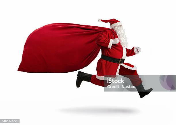 Santa Claus On The Run Stock Photo - Download Image Now - Santa Claus, Christmas, Running
