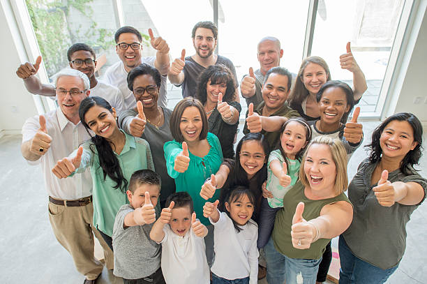 istock Group of People Giving a Thumbs Up 502393896