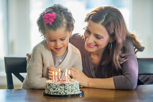 istock Happy Girl with Her Cake 502394228