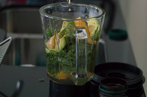 istock Fresh fruits and vegetables in a blender 502395774