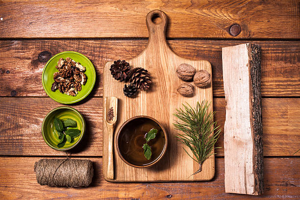 istock Still life with walnuts on a wooden board 502396930