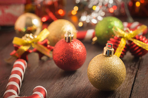 istock Christmas background  red ornament, golden gift box, berries 502397692