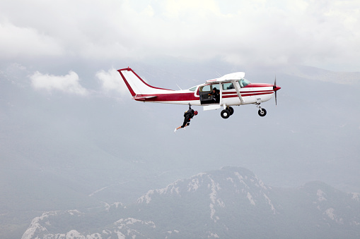 Parachutist jumps from a plane