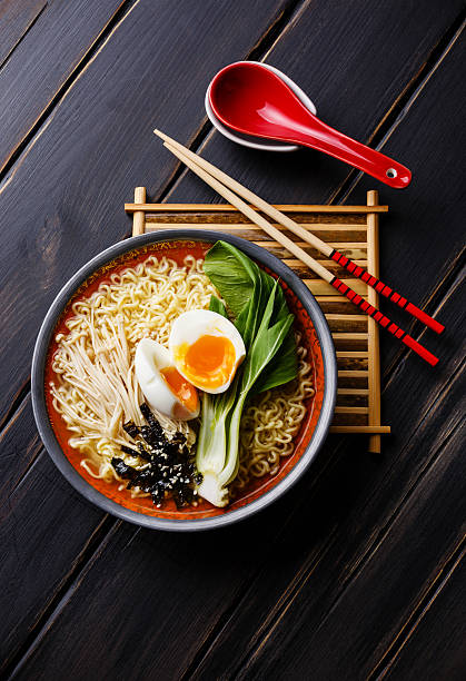 istock Ramen Asian noodles with egg, enoki and pak choi cabbage 502413158