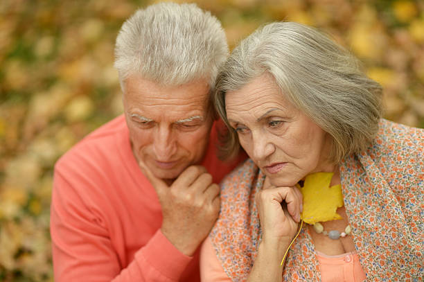 istock Couple in autumn park 502413406