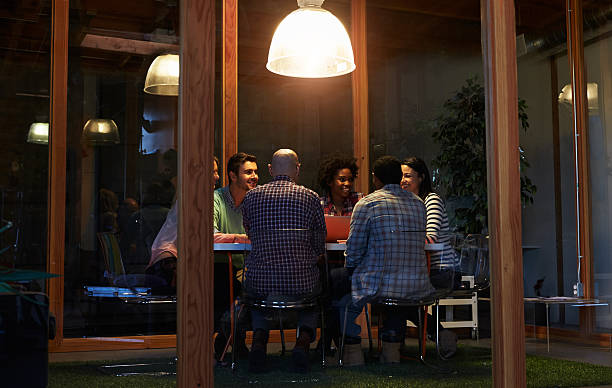 istock Late Night Meeting Around Table In Design Office 502414960