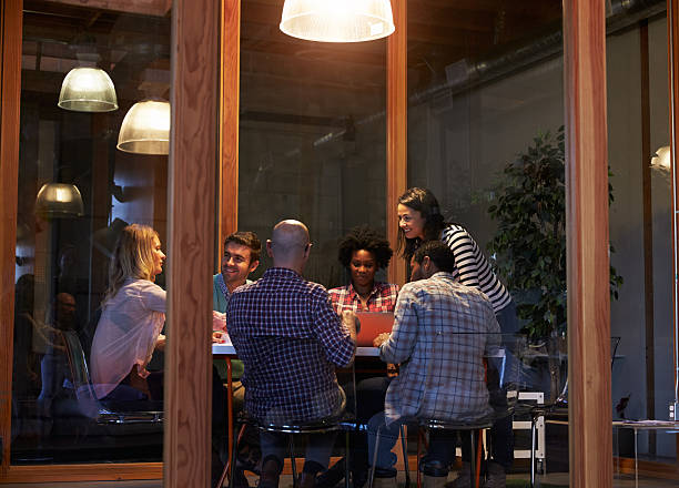istock Late Night Meeting Around Table In Design Office 502415002